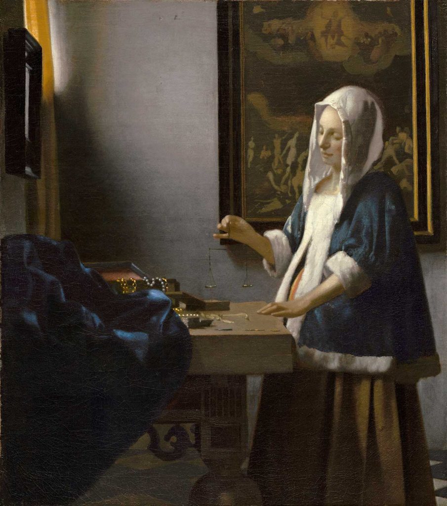 Woman Holding a Balance by Johannes Vermeer